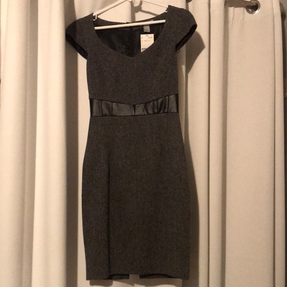Beautiful tweed dress with leather waistband.  Never worn.